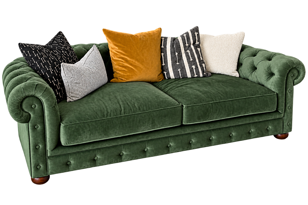 Green upholstered couch made by Duvenci Interiors