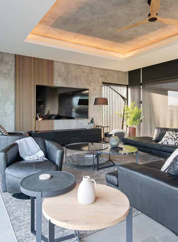 Duvenci living room with layered neutral textiles. Photography: Stephen Rowley.