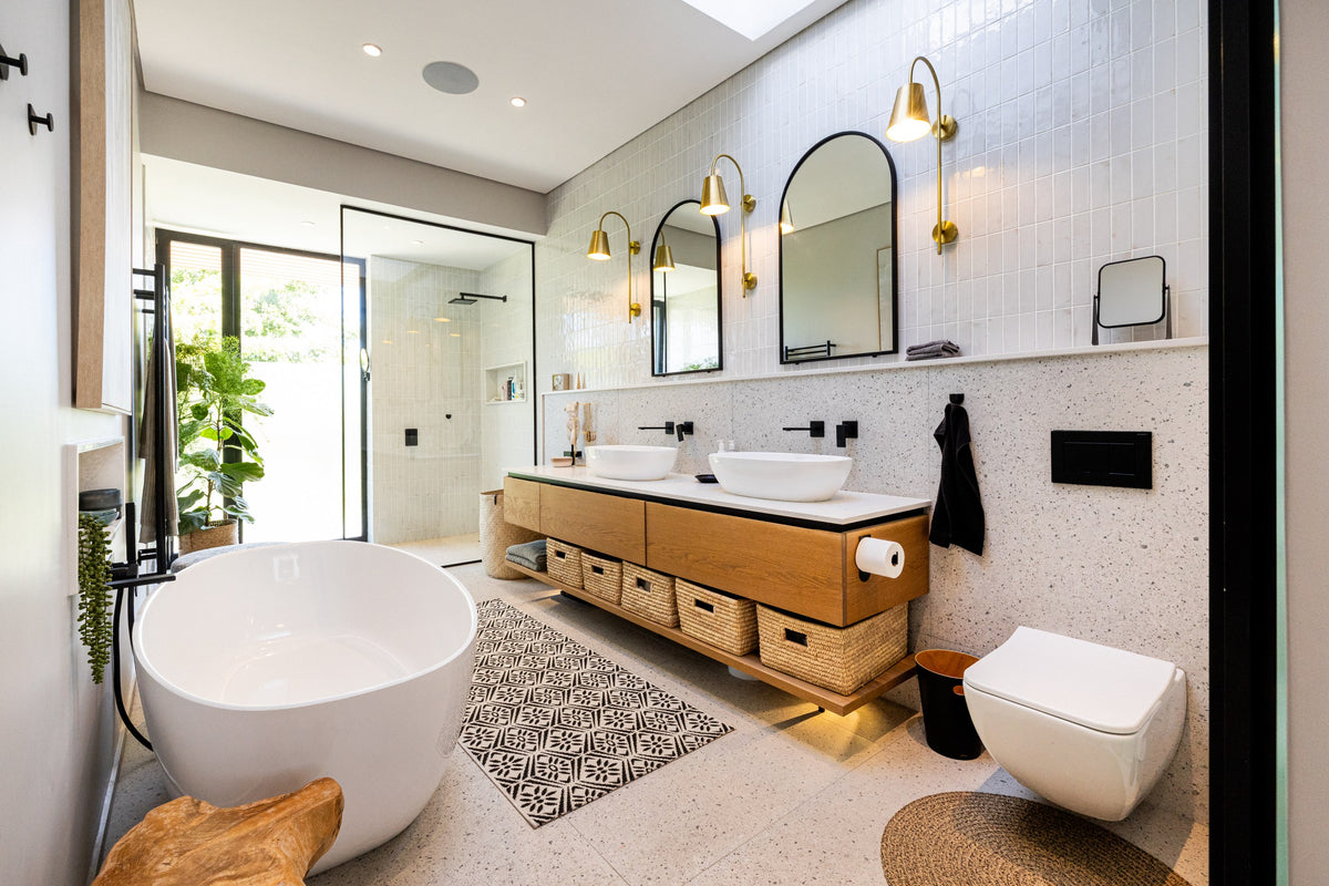 Duvenci Interiors — Bathroom with freestanding bath and timber vanity