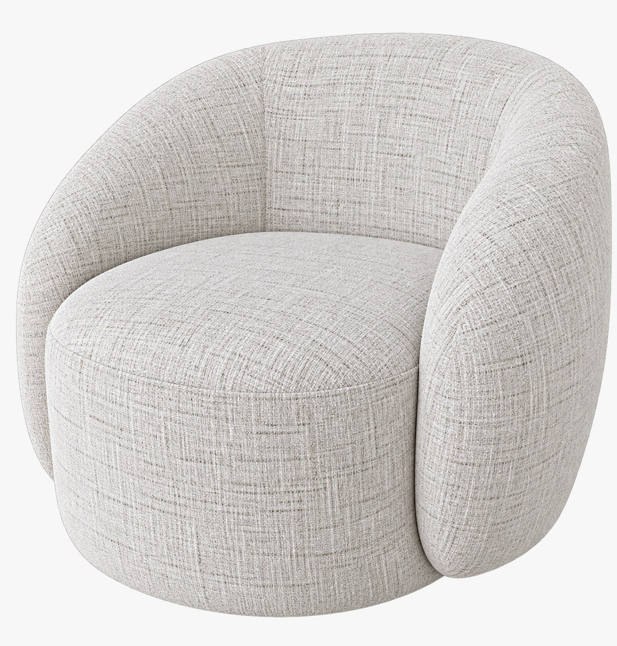 Rounded upholstered armchair, designed and manufactured by Duvenci Interiors